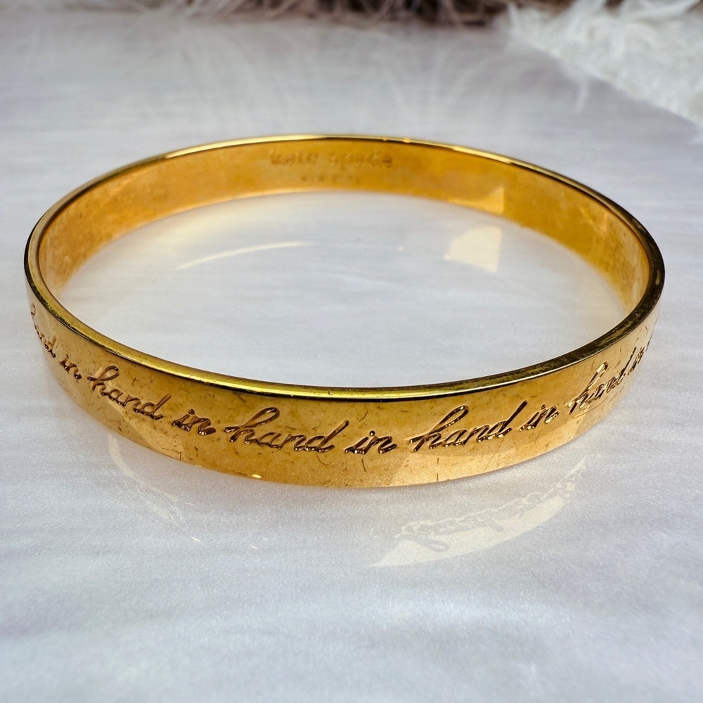 Kate Spade “Hand and Hand” inscribed Goldtone Bangle Bracelet - Picture 8 of 15